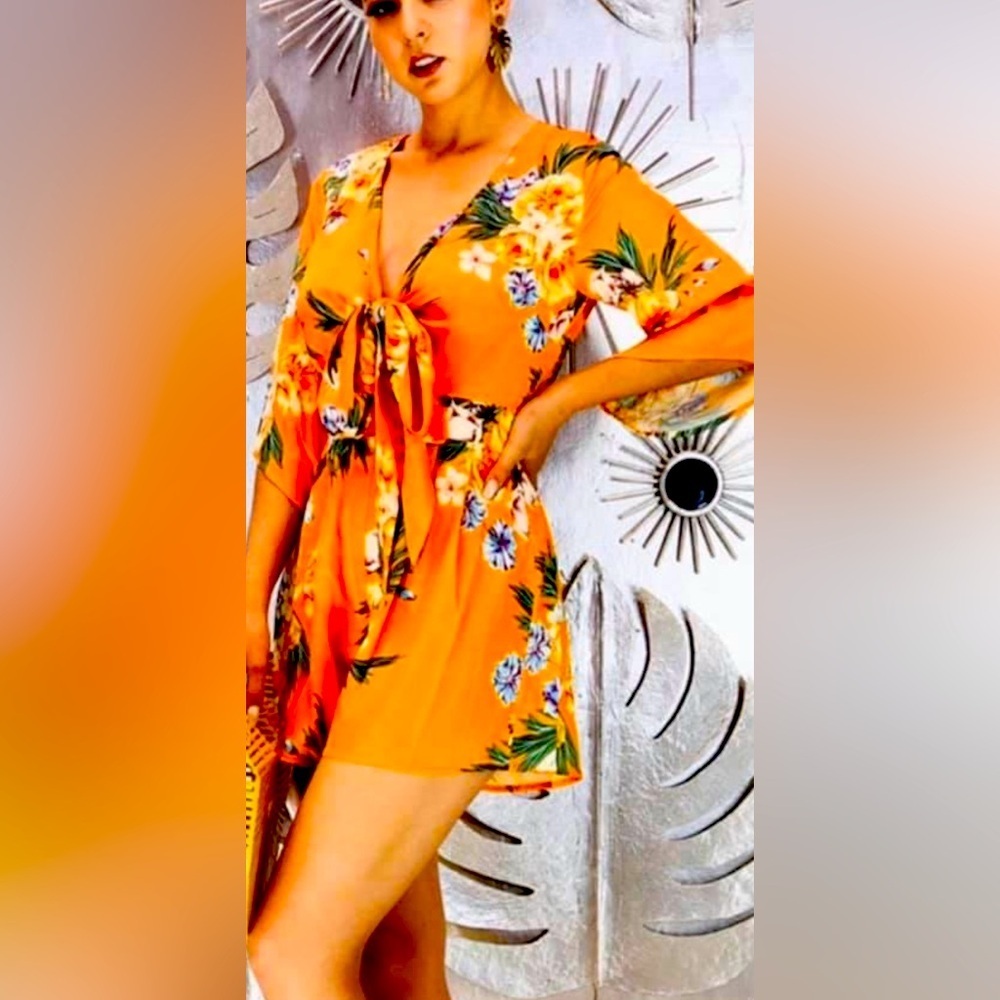 Orange Romper with peek though under bust.NWOT #18